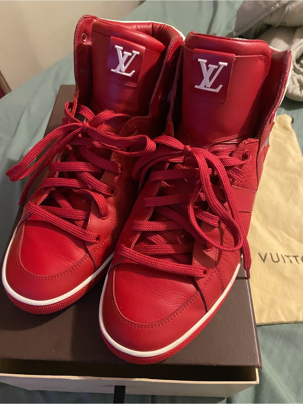 Louis Vuitton Red Leather High-Top Sneakers with a Reflective design